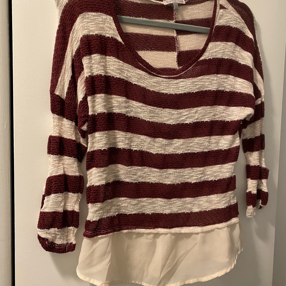 White and maroon sweater